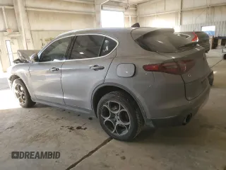 2018 Alfa Romeo Stelvio Ti z VIN ZASFAKBNXJ7B80163, wystawiony jako Copart lot #41805085 z przebiegiem Nie podano mil oraz Szkody całkowita. Historia ofert i sprzedaży dostępna na DreamBid. Obrazek 2.