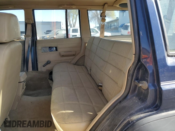 1994 Jeep Cherokee SE with VIN 1J4FJ28S7RL175098, listed as a Copart auction lot 52568445 with 108,574 mi miles and Salvage Title. Bid and sale history available at carsss.com. Image 11.
