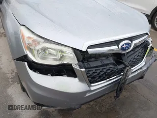 2015 Subaru Forester Touring with VIN JF2SJAUC8FH467730, listed as a IAAI auction lot 42403195 with 142,287 mi miles and . Bid and sale history available at DreamBid. Image 17.