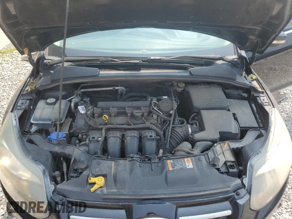2014 Ford Focus Titanium with VIN 1FADP3J20EL347435, listed as a Copart auction lot 54947345 with 144,169 mi miles and Salvage title. Bid and sale history available at DreamBid. Image 11.