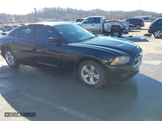 2014 Dodge Charger SE with VIN 2C3CDXBG6EH234509, listed as a IAAI auction lot 41618980 with 152,654 mi miles. Bid and sale history available at carsss.com. Image 1.