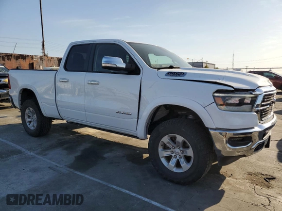 2020 Ram 1500 Laramie with VIN 1C6SRFDT0LN253615, listed as a Copart auction lot 49910145 with 77,895 mi miles and Salvage Title. Bid and sale history available at carsss.com. Image 4.
