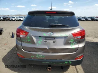 2010 Hyundai Tucson GLS with VIN KM8JU3AC8AU056499, listed as a Copart auction lot 53057365 with 119,906 mi miles and Salvage Title. Bid and sale history available at DreamBid. Image 6.