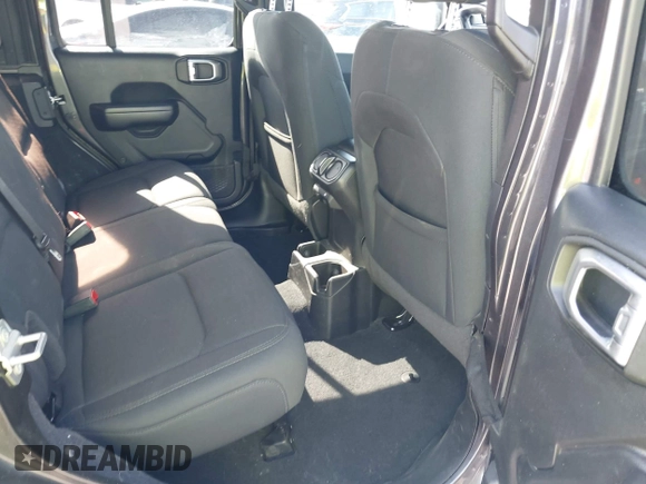 2020 Jeep Wrangler Unlimited Sport Altitude with VIN 1C4HJXDG7LW215344, listed as a IAAI auction lot 41924460 with 51,802 mi miles and . Bid and sale history available at DreamBid. Image 8.