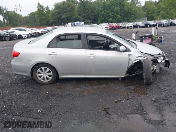 2011 Toyota Corolla L with VIN 2T1BU4EE1BC724135, listed as a IAAI auction lot 40054479 with 190,235 mi miles. Bid and sale history available at carsss.com. Image 12.
