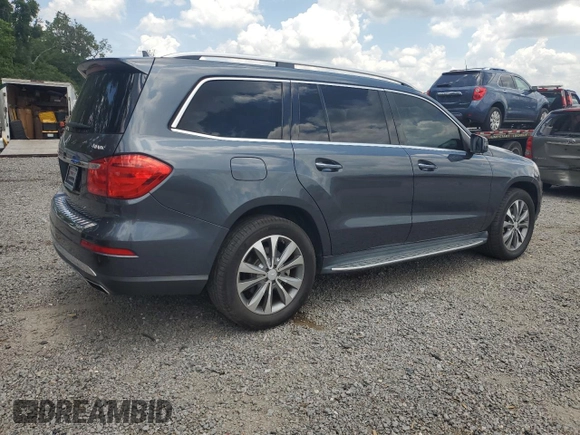 2014 Mercedes-Benz GL 450 z VIN 4JGDF7CE0EA303471, wystawiony jako Copart lot #58673045 z przebiegiem 182 455 mil mil oraz Tytuł czysty. Historia ofert i sprzedaży dostępna na DreamBid. Obrazek 3.