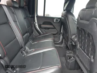 2020 Jeep Gladiator Rubicon z VIN 1C6JJTBG7LL181833, wystawiony jako IAAI lot #42493073 z przebiegiem 13 775 mil mil oraz . Historia ofert i sprzedaży dostępna na DreamBid. Obrazek 8.