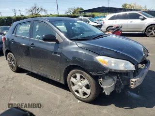 2009 Toyota Matrix with VIN 2T1KU40E89C044203, listed as a Copart auction lot 51802845 with 128,260 mi miles and Salvage Title. Bid and sale history available at carsss.com. Image 4.