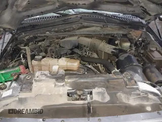 2004 Ford F-250 XL z VIN 1FTNX21L54EA40055, wystawiony jako IAAI lot #41363730 z przebiegiem Nie podano mil oraz . Historia ofert i sprzedaży dostępna na DreamBid. Obrazek 10.