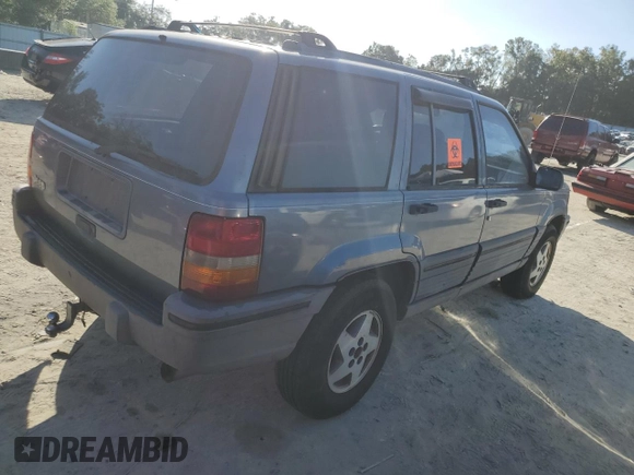 1995 Jeep Grand Cherokee Laredo with VIN 1J4FX58S4SC742471, listed as a Copart auction lot 76203034 with 206,717 mi miles and Non Repairable. Bid and sale history available at carsss.com. Image 3.