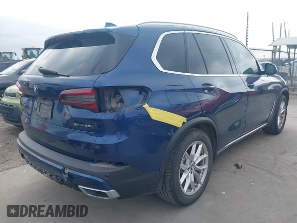 2020 BMW X5 sDrive40i with VIN 5UXCR4C07L9C27998, listed as a IAAI auction lot 41652088 with 59,009 mi miles and . Bid and sale history available at DreamBid. Image 4.