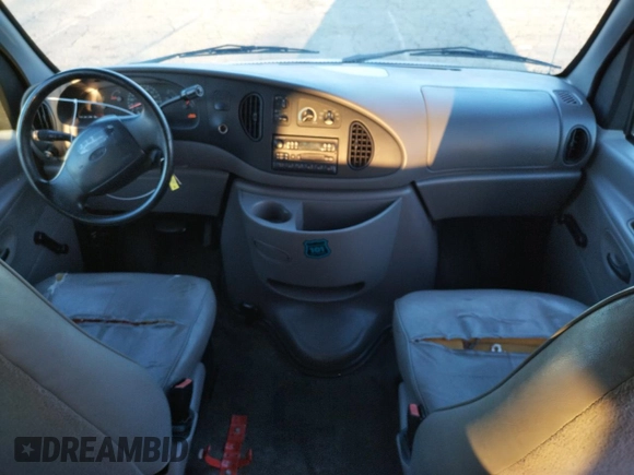 1999 Ford Econoline Passenger XL with VIN 1FBSS31L6XHC07800, listed as a Copart auction lot 83122494 with 96,238 mi miles and Clean Title. Bid and sale history available at DreamBid. Image 8.
