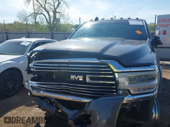 2020 Ram 2500 Laramie z VIN 3C6UR5FL0LG230960, wystawiony jako IAAI lot #42029886 z przebiegiem 61 544 mil mil oraz . Historia ofert i sprzedaży dostępna na DreamBid. Obrazek 11.