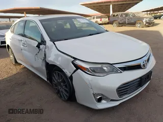 2015 Toyota Avalon Limited with VIN 4T1BK1EBXFU157728, listed as a IAAI auction lot 41551042 with 82,979 mi miles and . Bid and sale history available at DreamBid. Image 6.