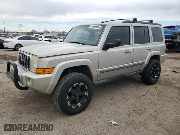 2009 Jeep Commander Sport z VIN 1J8HH48K79C519351, wystawiony jako Copart lot #44996585 z przebiegiem 153 891 mil mil oraz Czysty tytuł • Clean title. Historia ofert i sprzedaży dostępna na DreamBid. Obrazek 1.