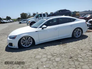 2020 Audi A5 Sportback Premium с VIN WAUANCF51LA007433, выставлен на аукционе Copart как лот 55097865 с пробегом 86 127 миль миль и Списание • Salvage title. История ставок и продаж доступна на DreamBid. Изображение 1.