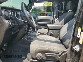 2020 Jeep Wrangler Unlimited Sport Altitude with VIN 1C4HJXDG2LW102854, listed as a Copart auction lot 60245695 with 134,575 mi miles and Non repairable. Bid and sale history available at DreamBid. Image 7.