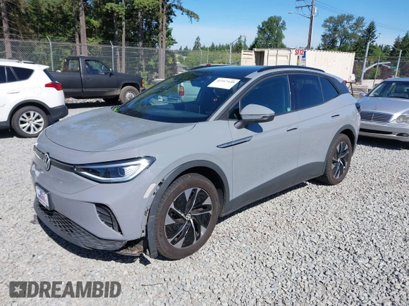 2021 Volkswagen ID.4 Pro S z VIN WVGTMPE20MP058882, wystawiony jako IAAI lot #42317440 z przebiegiem 64 473 mil mil oraz . Historia ofert i sprzedaży dostępna na DreamBid. Obrazek 20.
