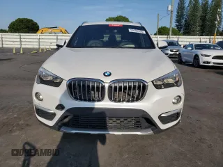 2018 BMW X1 sDrive28i z VIN WBXHU7C39J5H42980, wystawiony jako Copart lot #59308535 z przebiegiem 122 135 mil mil oraz Czysty tytuł • Clean title. Historia ofert i sprzedaży dostępna na DreamBid. Obrazek 5.