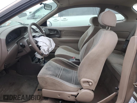 1998 Ford Escort with VIN 3FALP1138WR141453, listed as a Copart auction lot 87408174 with 116,715 mi miles and Salvage title. Bid and sale history available at DreamBid. Image 7.