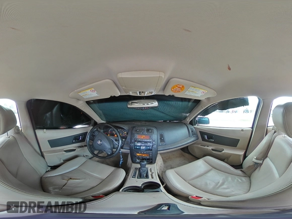 2004 Cadillac CTS with VIN 1G6DM577840132566, listed as a Copart auction lot 82704214 with 150,772 mi miles and Salvage Title. Bid and sale history available at DreamBid. Image 13.