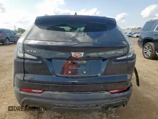 2020 Cadillac XT4 FWD Sport with VIN 1GYFZER45LF146781, listed as a Copart auction lot 59043685 with 65,177 mi miles and Salvage title. Bid and sale history available at DreamBid. Image 6.