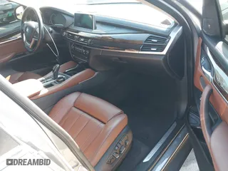 2015 BMW X6 xDrive50i with VIN 5UXKU6C52F0F94060, listed as a IAAI auction lot 41299202 with 67,835 mi miles. Bid and sale history available at carsss.com. Image 5.