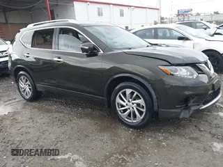2015 Nissan Rogue SL with VIN 5N1AT2MVXFC911260, listed as a IAAI auction lot 41823690 with 128,121 mi miles. Bid and sale history available at carsss.com. Image 1.