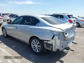 2014 Infiniti Q50 Premium with VIN JN1BV7AP2EM691601, listed as a IAAI auction lot 42323769 with 93,413 mi miles and . Bid and sale history available at DreamBid. Image 3.