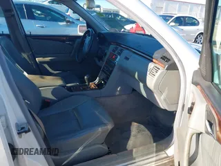 1999 Mercedes-Benz E-Class with VIN WDBJF82H0XX015778, listed as a IAAI auction lot 41269886 with 184,011 mi miles. Bid and sale history available at carsss.com. Image 5.