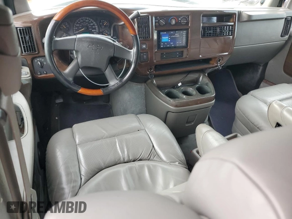 2003 Chevrolet Express Cargo YF7 Upfitter with VIN 1GBFG15T031162552, listed as a Copart auction lot 79677874 with 187,193 mi miles and Salvage title. Bid and sale history available at DreamBid. Image 8.