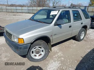 1995 Isuzu Rodeo z VIN 4S2CM58V4S4363500, wystawiony jako IAAI lot #41821801 z przebiegiem 94 480 mil mil oraz . Historia ofert i sprzedaży dostępna na DreamBid. Obrazek 2.