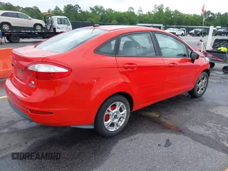 2014 Ford Fiesta SE with VIN 3FADP4BJ7EM205299, listed as a IAAI auction lot 42109032 with 145,797 mi miles. Bid and sale history available at carsss.com. Image 4.