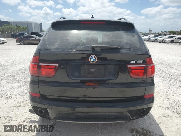 2013 BMW X5 xDrive35i z VIN 5UXZV4C58D0B21356, wystawiony jako Copart lot #54872375 z przebiegiem 113 825 mil mil oraz Szkoda całkowita • Salvage title. Historia ofert i sprzedaży dostępna na DreamBid. Obrazek 6.