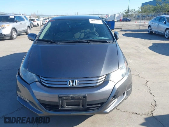 2010 Honda Insight LX with VIN JHMZE2H50AS019740, listed as a IAAI auction lot 41665527 with 74,022 mi miles and . Bid and sale history available at DreamBid. Image 12.