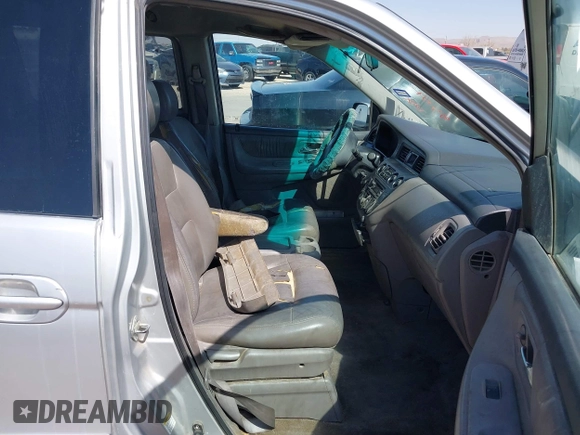 2004 Honda Odyssey EX-L with VIN 5FNRL18904B080009, listed as a IAAI auction lot 41736651 with 461,326 mi miles and . Bid and sale history available at DreamBid. Image 5.