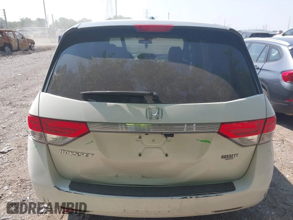 2014 Honda Odyssey EX-L with VIN 5FNRL5H63EB131596, listed as a IAAI auction lot 42402427 with 106,156 mi miles and . Bid and sale history available at DreamBid. Image 17.