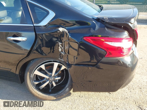 2016 Nissan Altima SR with VIN 1N4AL3AP7GC212210, listed as a IAAI auction lot 41923139 with 26,433 mi miles and . Bid and sale history available at carsss.com. Image 6.