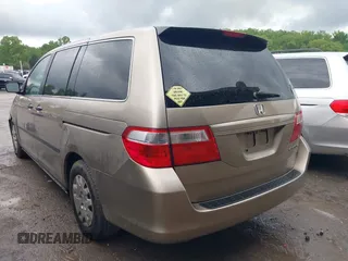 2005 Honda Odyssey LX with VIN 5FNRL382X5B116840, listed as a IAAI auction lot 42070477 with 268,898 mi miles. Bid and sale history available at carsss.com. Image 3.