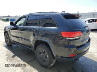 2017 Jeep Grand Cherokee Laredo with VIN 1C4RJEAG1HC813810, listed as a Copart auction lot 59703545 with 57,180 mi miles and Clean title. Bid and sale history available at DreamBid. Image 2.