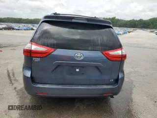 2015 Toyota Sienna LE AAS with VIN 5TDKK3DC5FS596673, listed as a Copart auction lot 61382965 with 176,447 mi miles and Salvage title. Bid and sale history available at DreamBid. Image 6.