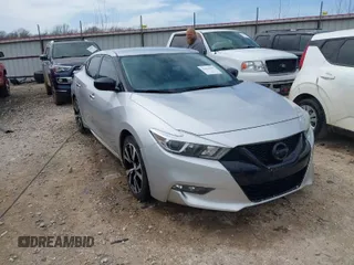 2018 Nissan Maxima Platinum z VIN 1N4AA6AP3JC407381, wystawiony jako IAAI lot #41811375 z przebiegiem 88 439 mil mil oraz . Historia ofert i sprzedaży dostępna na DreamBid. Obrazek 1.