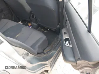 2007 Nissan Versa SL z VIN 3N1BC13E57L379798, wystawiony jako IAAI lot #41458835 z przebiegiem 136 459 mil mil oraz . Historia ofert i sprzedaży dostępna na DreamBid. Obrazek 8.