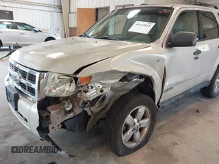 2008 Ford Escape XLT with VIN 1FMCU93198KE17879, listed as a IAAI auction lot 40125825 with 214,373 mi miles and . Bid and sale history available at DreamBid. Image 6.