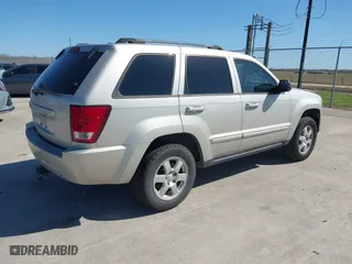 2010 Jeep Grand Cherokee Laredo with VIN 1J4PS4GK1AC111965, listed as a IAAI auction lot 41776362 with 209,042 mi miles. Bid and sale history available at carsss.com. Image 4.