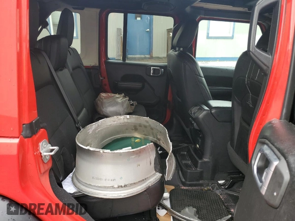 2021 Jeep Wrangler Unlimited Freedom with VIN 1C4HJXDN0MW605573, listed as a Copart auction lot 59896165 with 55,751 mi miles and Salvage title. Bid and sale history available at DreamBid. Image 11.