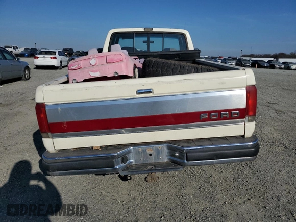 1991 Ford F-250 with VIN 1FTHX26M1MKA14231, listed as a Copart auction lot 41796005 with 6,983 mi miles and Salvage title. Bid and sale history available at DreamBid. Image 6.