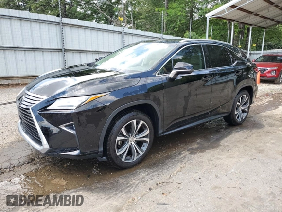 2016 Lexus RX 350 with VIN 2T2ZZMCAXGC012645, listed as a Copart auction lot 56951105 with 149,149 mi miles and Salvage title. Bid and sale history available at DreamBid. Image 1.