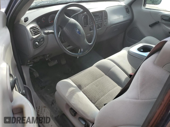 2003 Ford F-150 XL with VIN 1FTRX07273KB66549, listed as a Copart auction lot 83552004 with 205,026 mi miles and Salvage title. Bid and sale history available at DreamBid. Image 8.