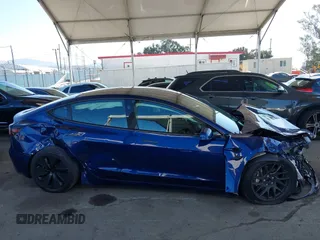 2024 Tesla Model 3 with VIN 5YJ3E1EA0RF745089, listed as a IAAI auction lot 41980217 with 9,851 mi miles and . Bid and sale history available at DreamBid. Image 13.